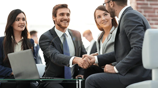 two-colleagues-handshaking-after-meeting-600nw-1192564624 1